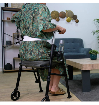 Déambulateur pliable 2 roues Modulo personne âgée assise